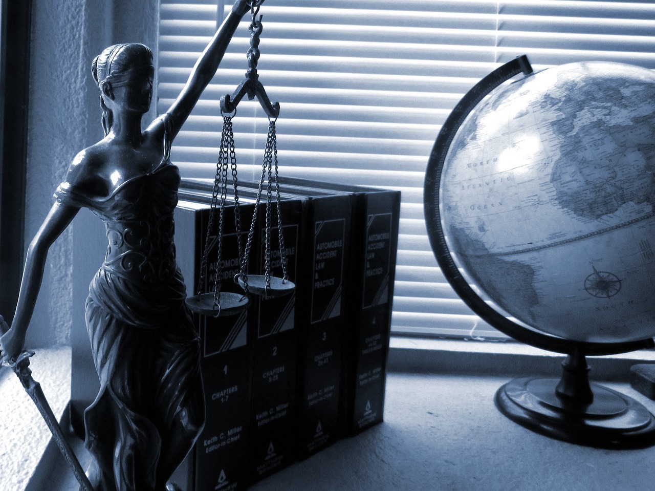 statue and globe